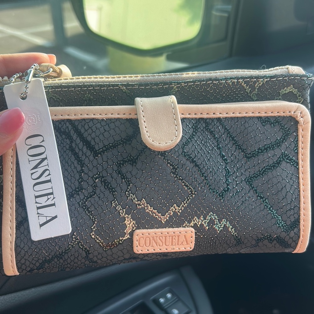This is another NEW wallet with Tags of Consuela perfect condition